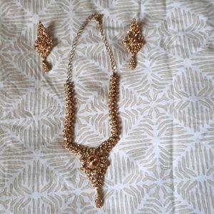 Indian semi-precious necklace and pierced earrings set.